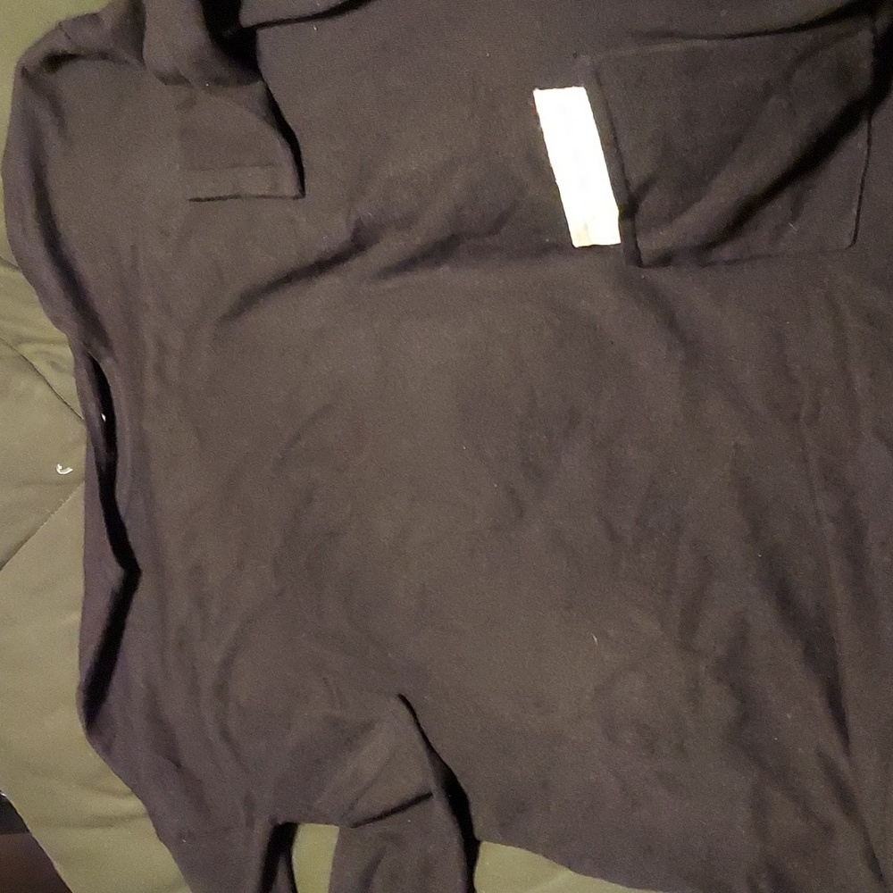 Rick Owen's vibes on this boxy funky theory sweater.